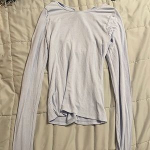blue long sleeve with half open back.